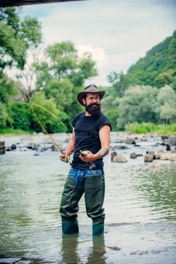 files/man-fisherman-holds-fish-happy-cheerful-people-fishing-river-angler-catching-bearded-show-technique-use-rod-having-good-197496891.webp